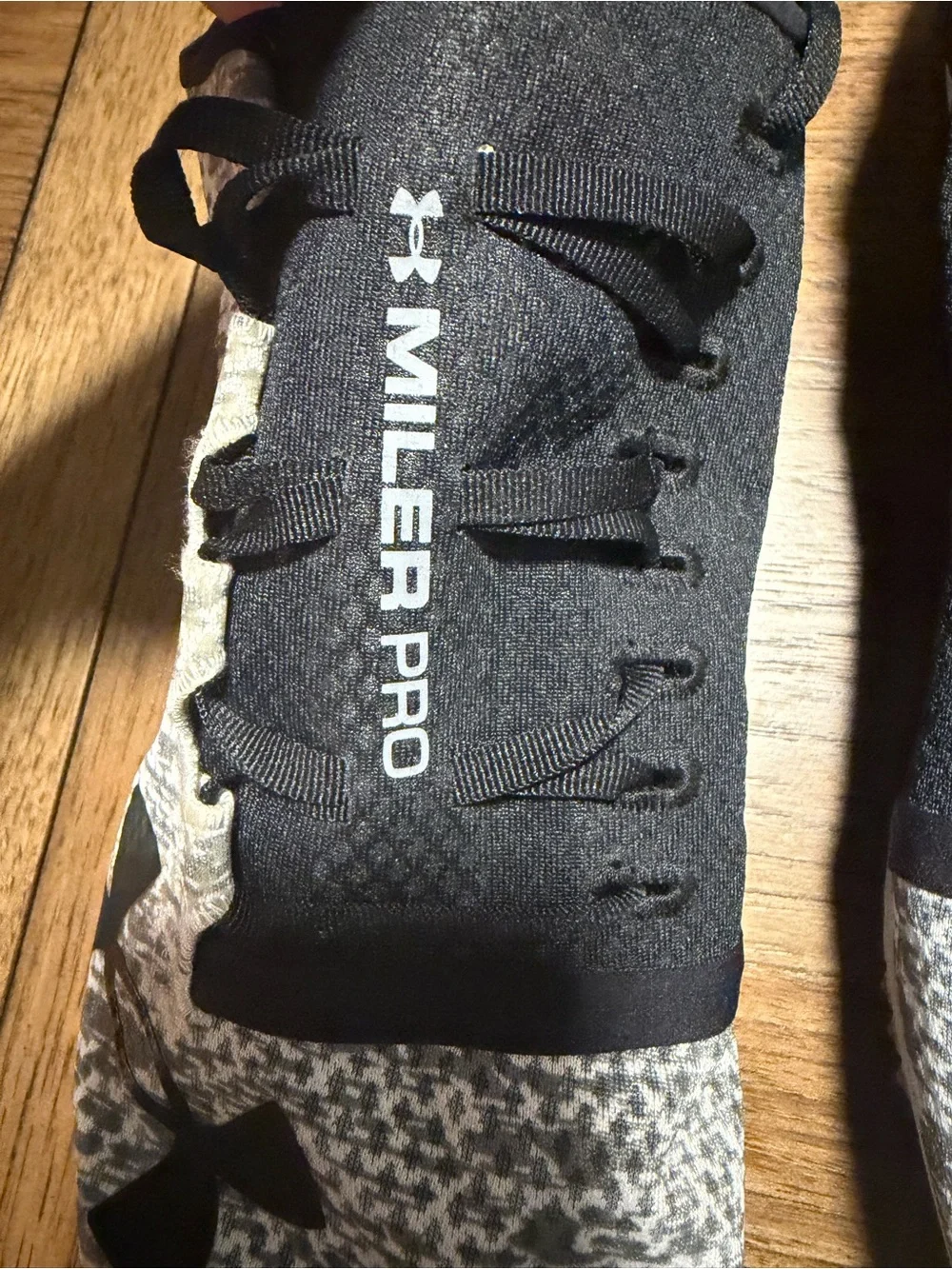 Under Armour Men’s Black and White Knit Athletic Shoes